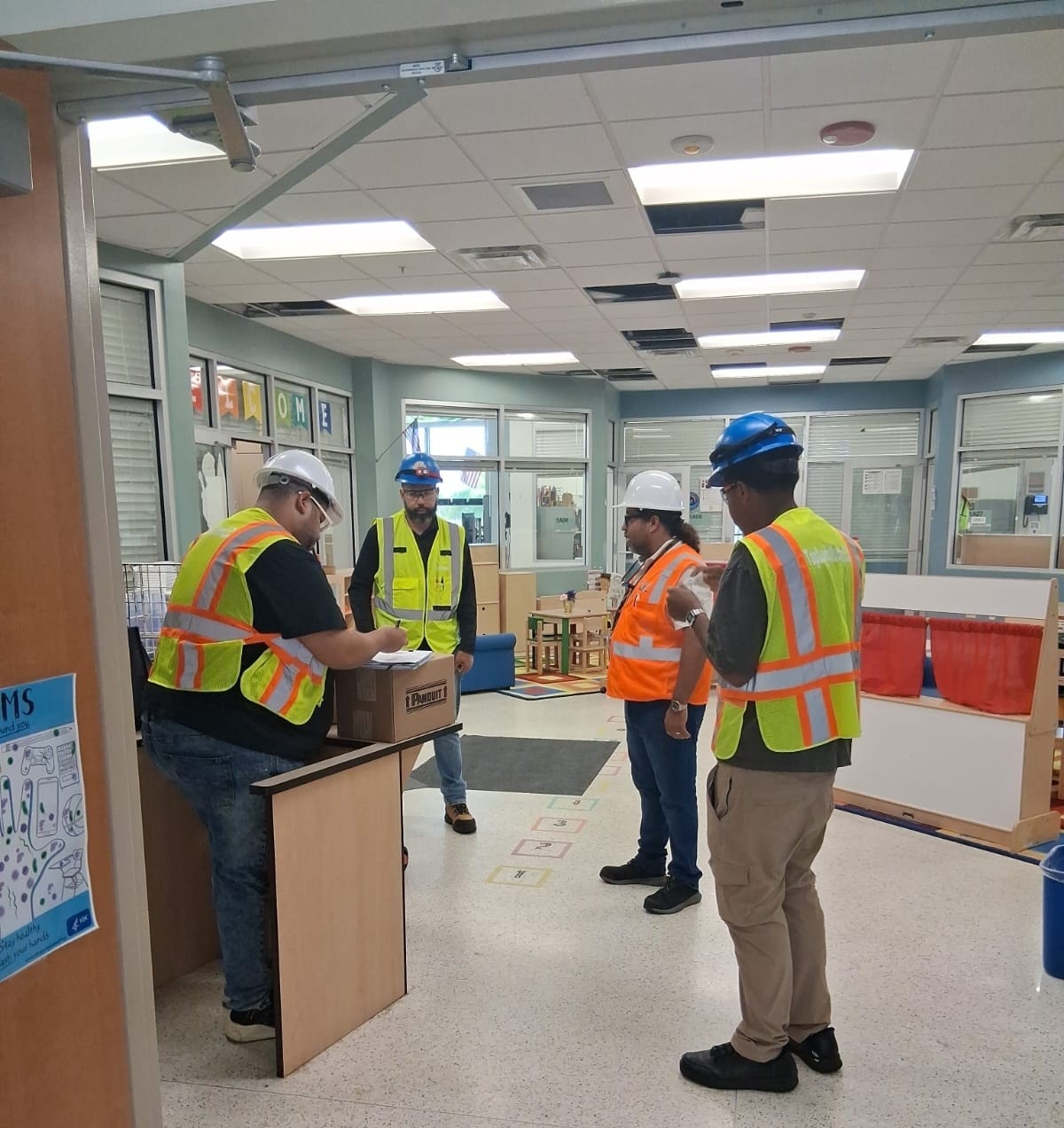 Safety team reviewing site plans together